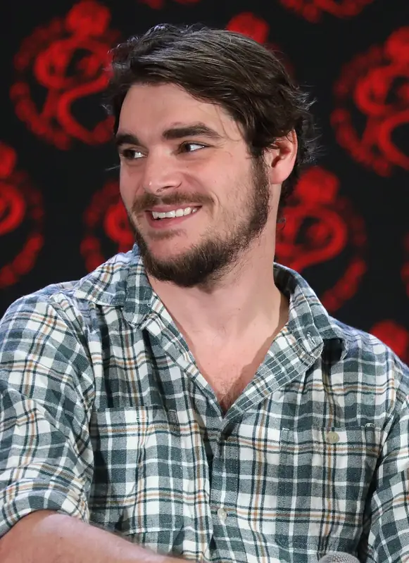 RJ Mitte speaking at a convention